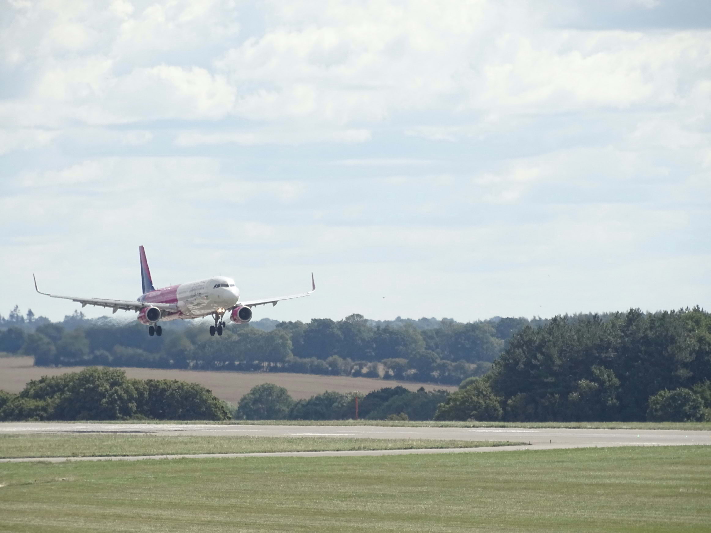 An aeroplane landing at Luton Airport