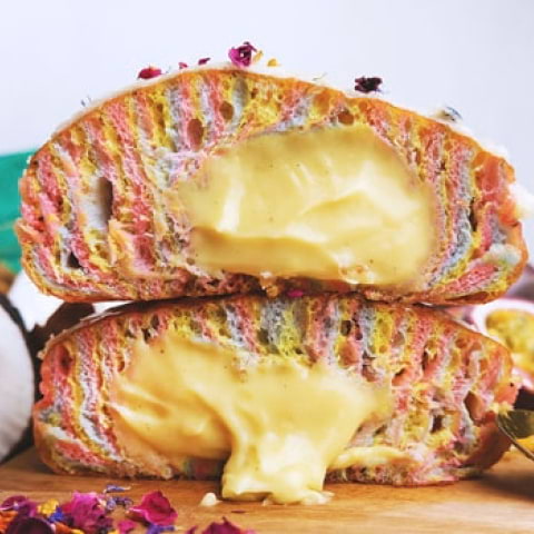 Crosstown and John Whaite bake rainbow doughnut for PRIDE with donations to akt charity