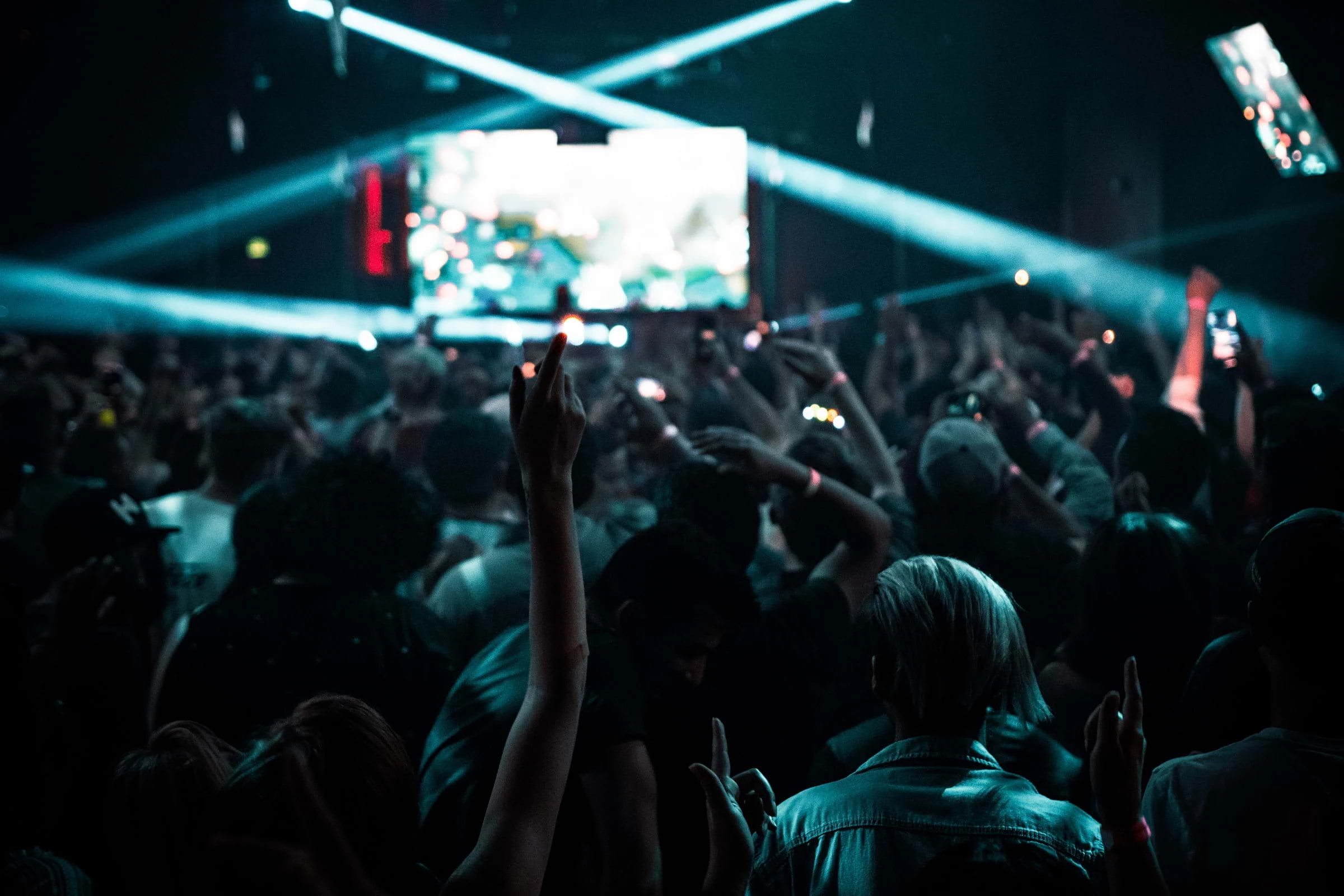A crowd dancing in a nightclub