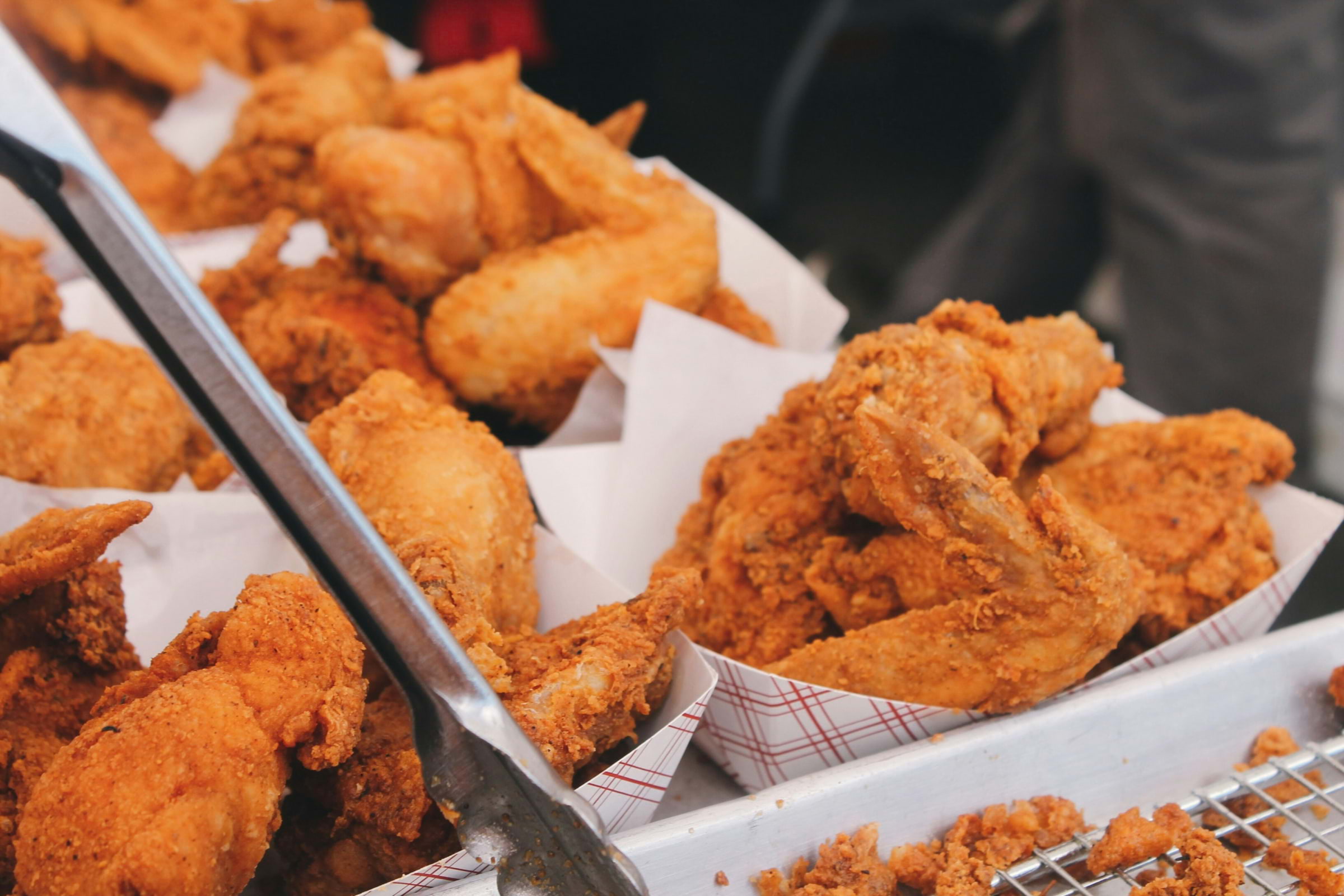 Bowls of crispy chicken wings