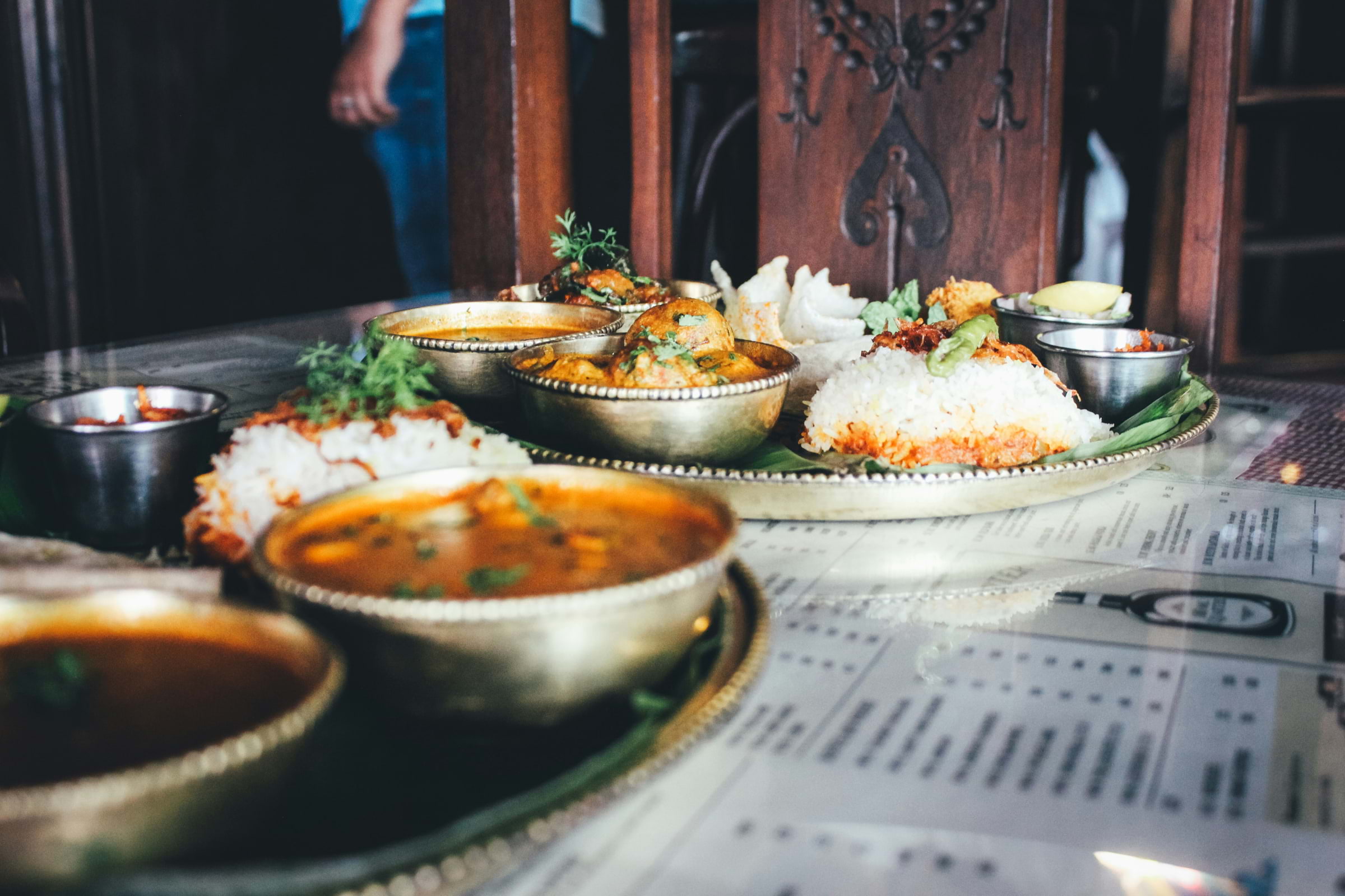 A spread of Indian food on a table