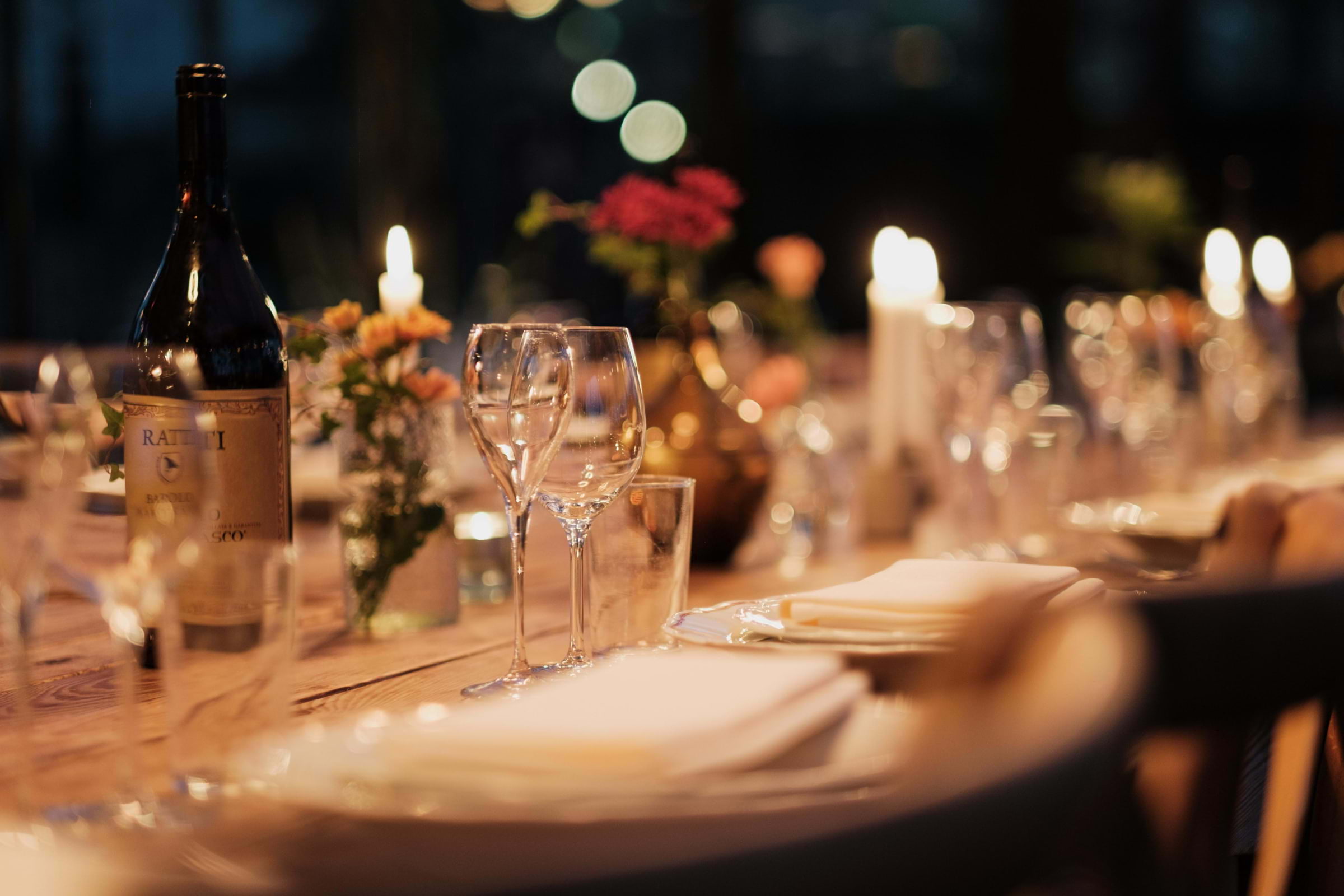 A restaurant table laid out for a Christmas party