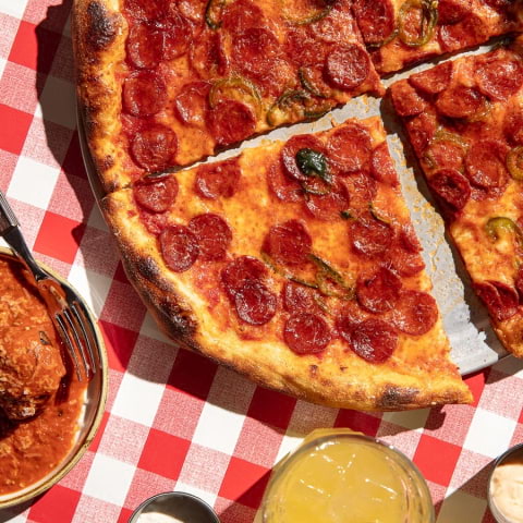 Have your martini and eat it too with Alley Cats' new pizza