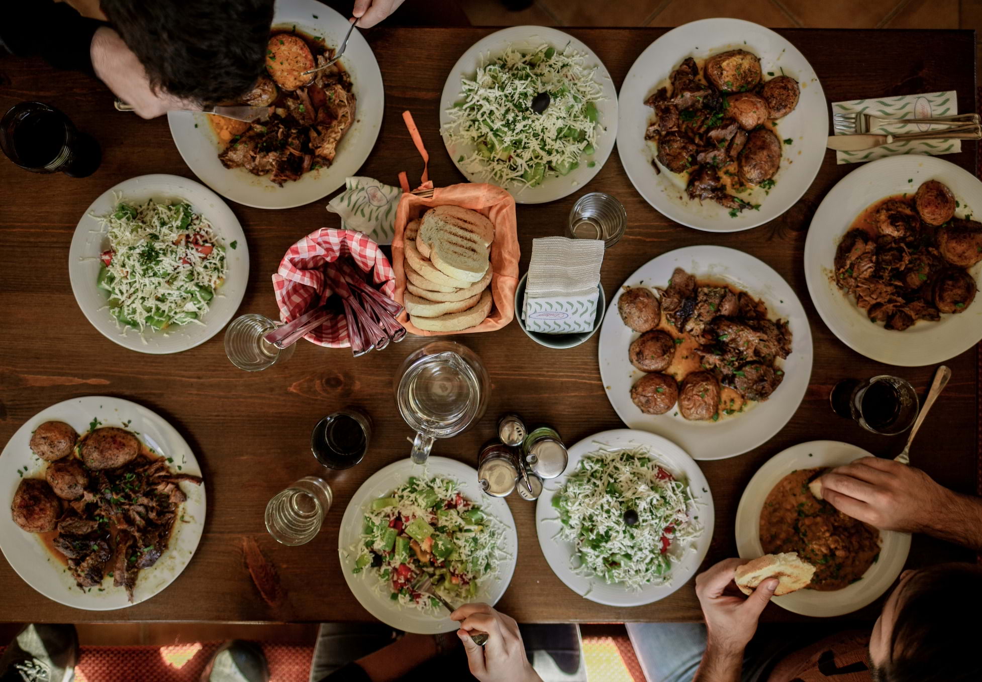 A bird's eye view of a spread of food on a table