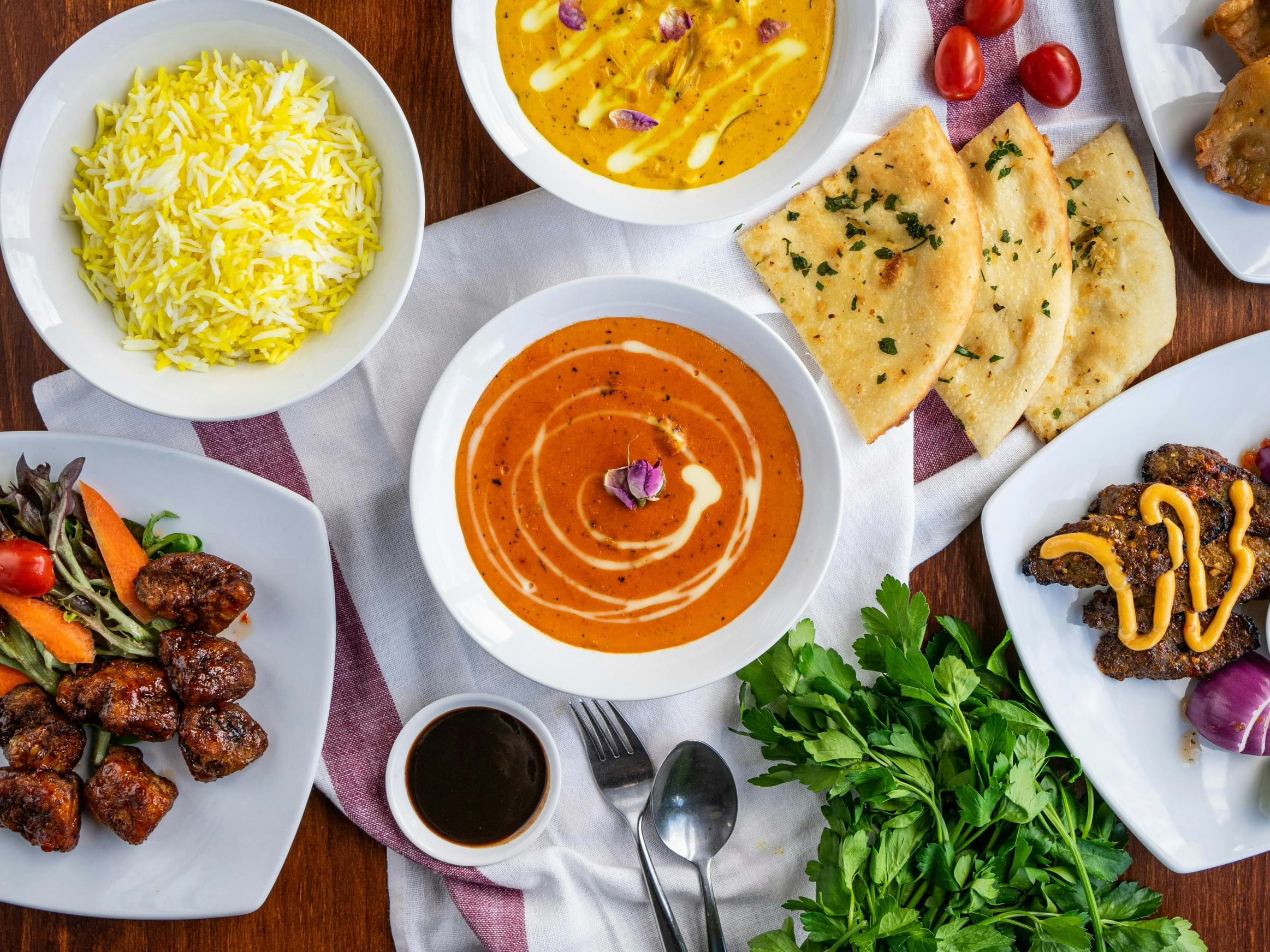 A spread of Indian food on a table