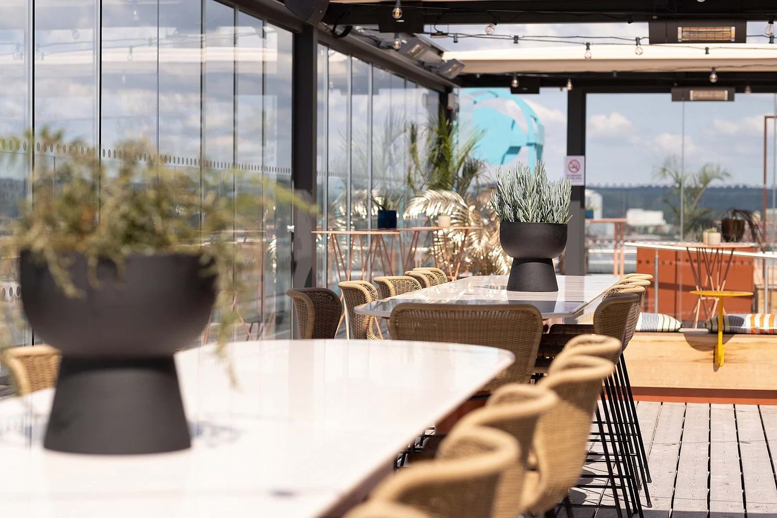 A sunny rooftop terrace in a restaurant
