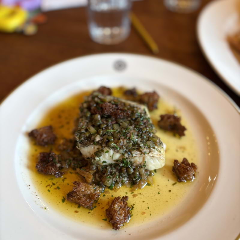 Charcoal grilled hake with lemon and brown butter &ndash; Bild fr&aring;n Hawksmoor St Pancras av Daniel&nbsp;S. (2026-02-23)