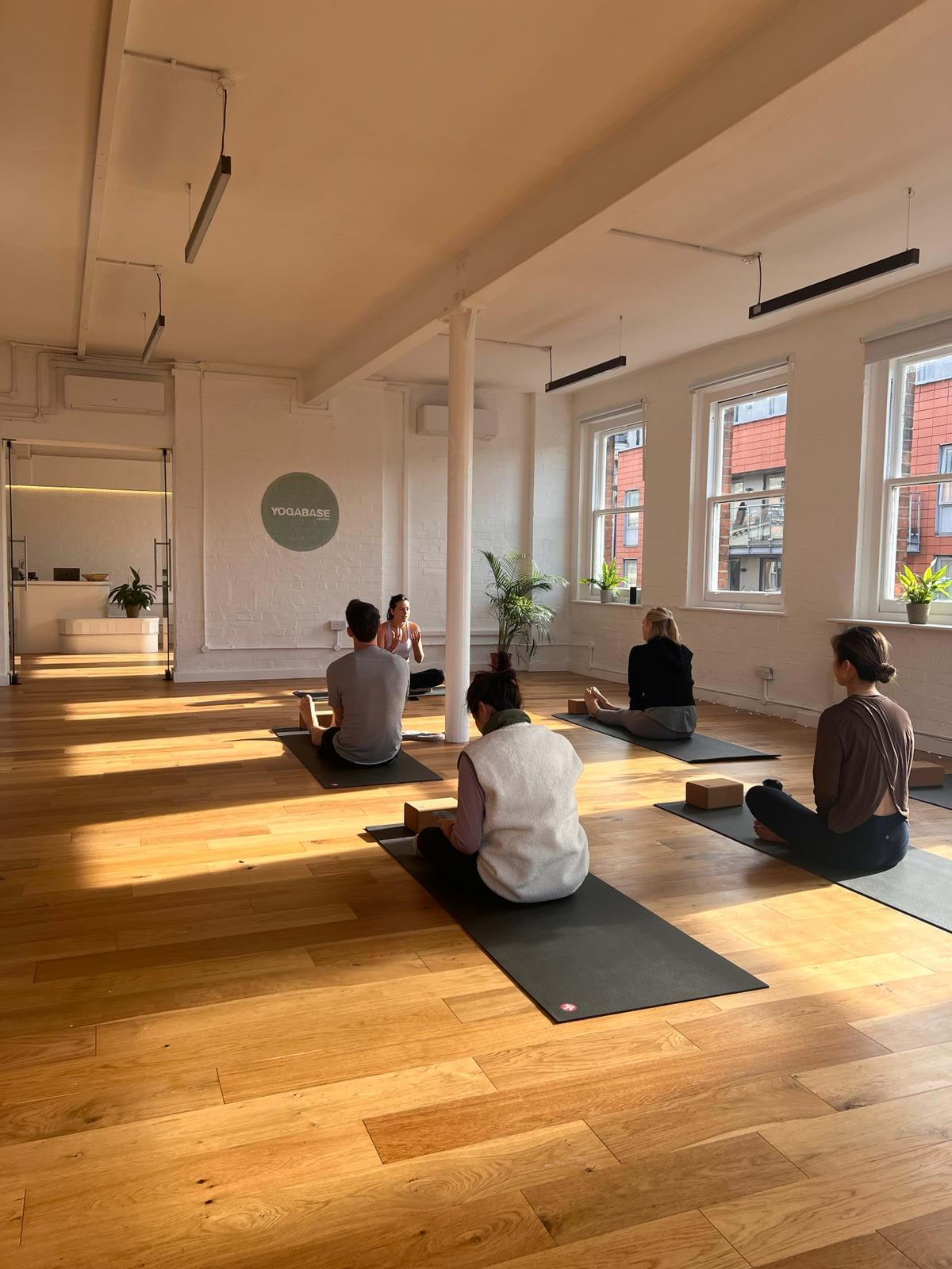 group of people doing yoga  – Photo from Yoga Base by Hayley E. (19/03/2024)