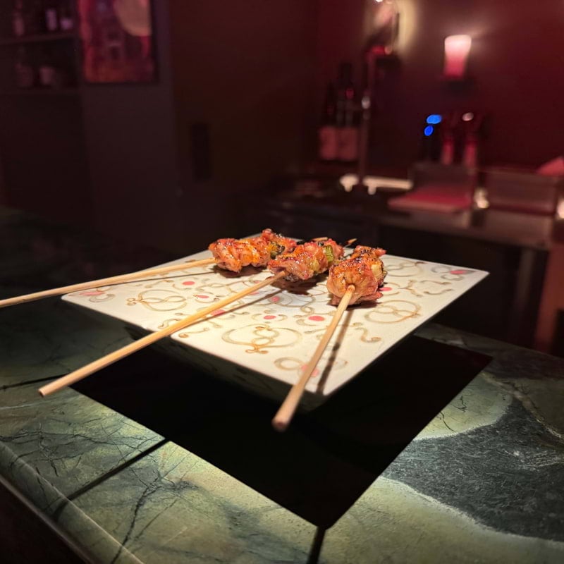 Anticucho (skewers of guinea fowl wings) Tebasaki & Fermented Mandarin – Photo from Black Milk Gastro Bar by Anna G. (22/12/2024)