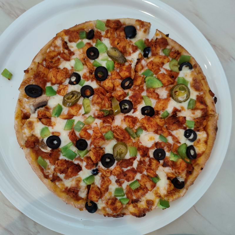 Chicken Tikka Pizza – Bild från Papa's Pizzeria av Shahzad A. (2024-07-19)